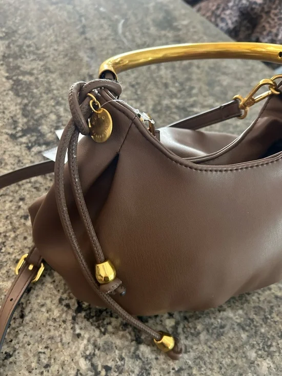 NWT BCBGeneration Chocolate Faux Leather Metal Handle Hobo
Shoulder Bag. - Picture 4 of 7